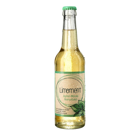 Limoment Apfel-Minze Naturlimo in Glasflasche und nachhaltigem Etikett mit Limoment-Logo und gezeichneter Minze.