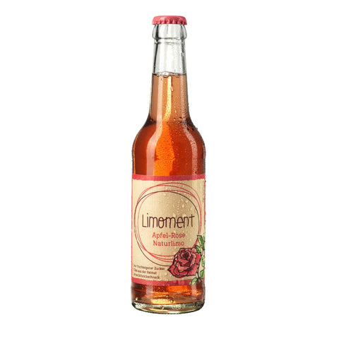 Limoment Apfel-Rose Naturlimo in Glasflasche mit natürlichem Etikett mit Limoment-Logo und gezeichneter Rose.
